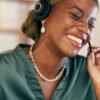 Call center, consultant and black woman talking laughing, telemarketing and explain new system, process and co